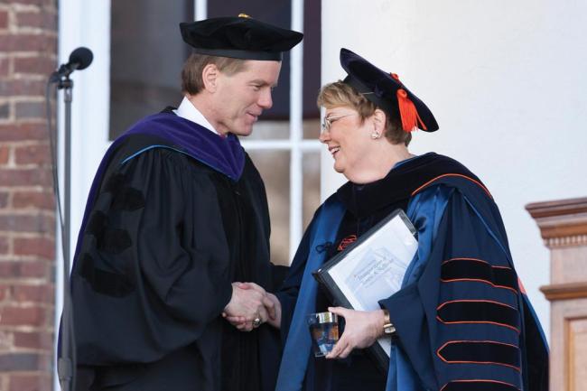 Teresa Sullivan shakes hands with someone